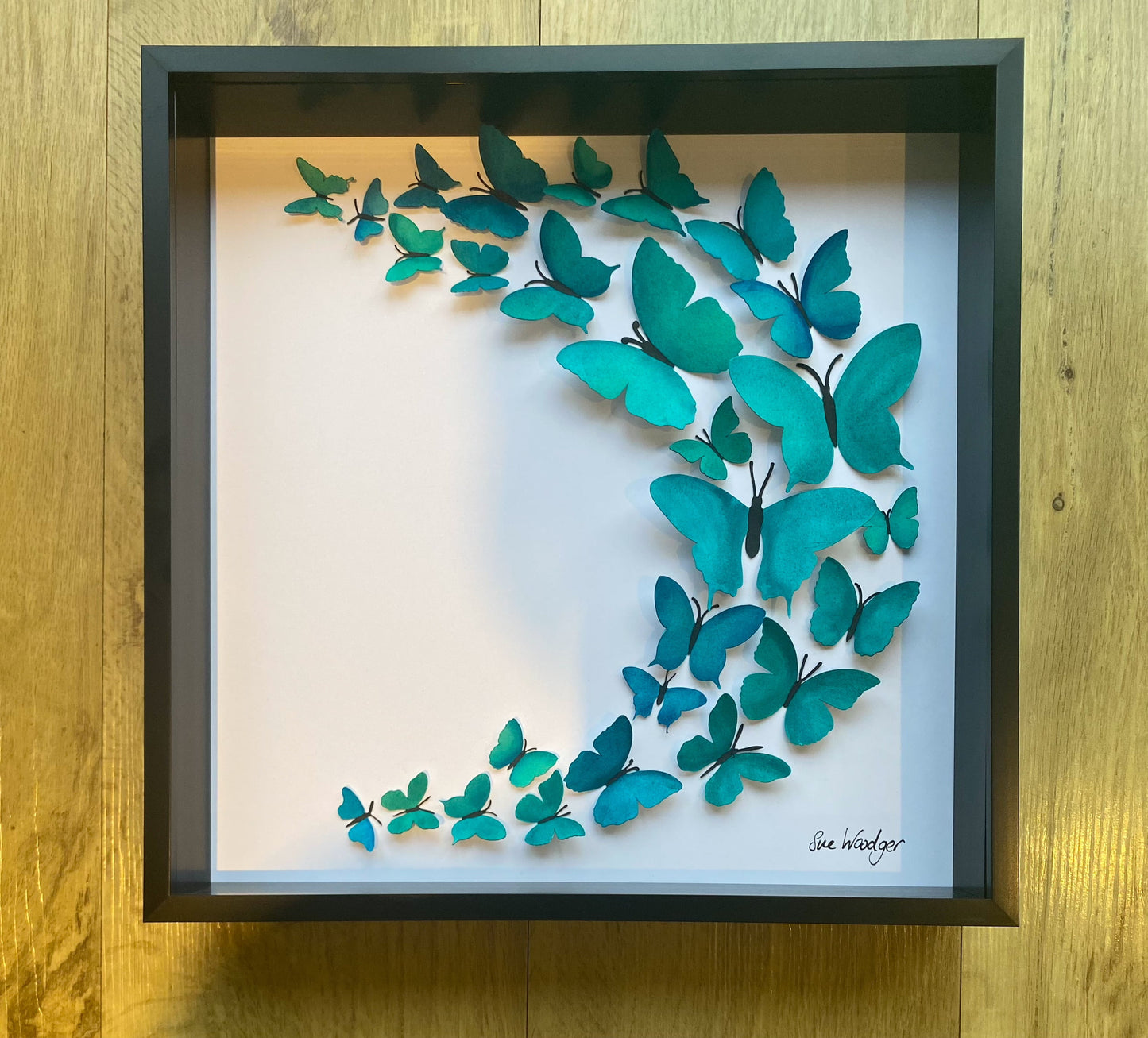 Sweeping Emerald butterflies - large