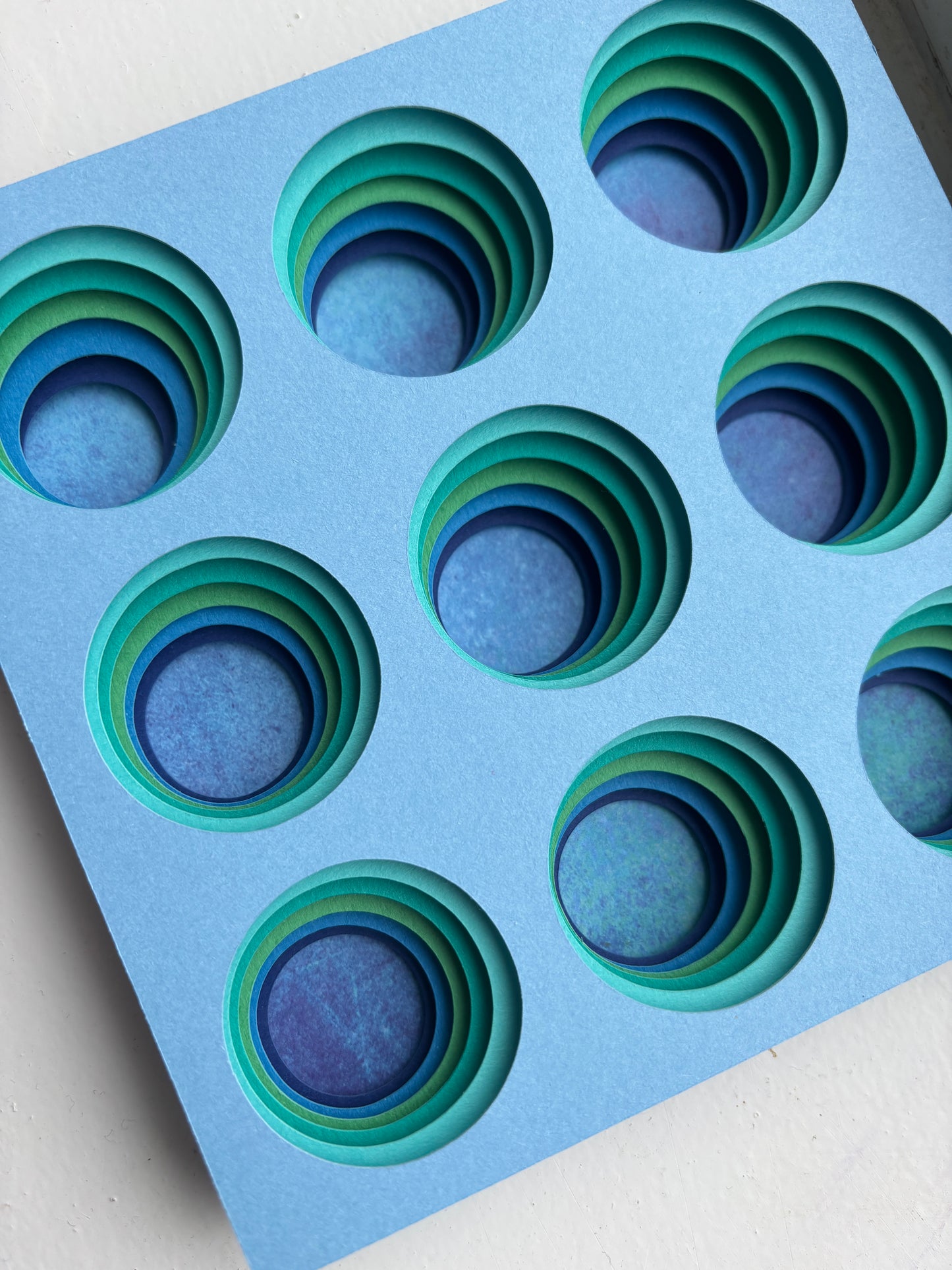 The Blue Circles - Layered paper sculpture